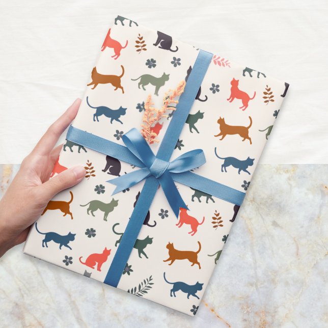 Moderne Katzen-Silhouette gemustert cremig Geschenkpapier (Stylish gift wrapping paper with a pattern of cat silhouettes in various colors)