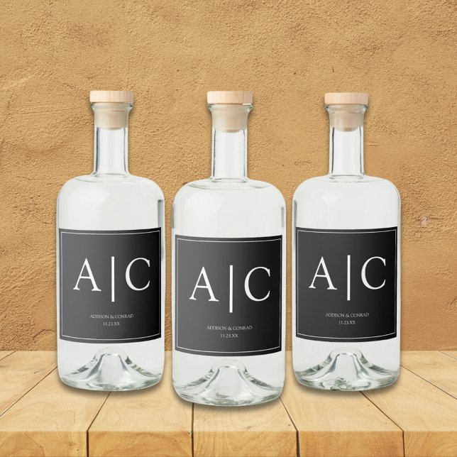 Moderne klassische Schwarz-Monogramm-Hochzeit Alkoholflaschenetikett (Von Creator hochgeladen)