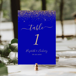 Moderne königsblaue Hochzeit mit goldener Glitter- Tischnummer