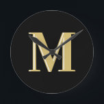 Moderne Monogramm Typografie Gold schwarz Runde Wanduhr<br><div class="desc">Moderne Monogramm Typografie Gold schwarz</div>