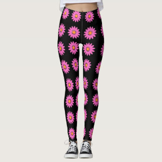 Moderne rosa Blumengestaltung auf schwarzem Hinter Leggings