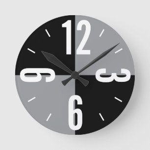 Moderne schwarz-graue Farbblöcke blockieren große Runde Wanduhr