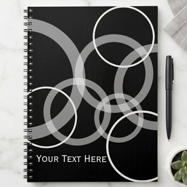 Moderne Schwarz-Weiß-Überlappende-Kreise-Gestaltun Notizblock (A sleek, modern spiral notebook with a stylish circle pattern, perfect for school or office use.)