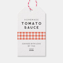 Moderne selbstgemachte Tomatensauce mit kariertem  Geschenkanhänger