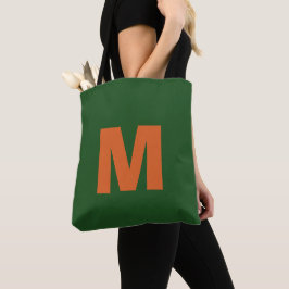 Moderne stilvolle grüne und orangefarbene Monogram