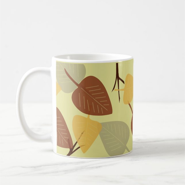 Moderne verstreute Blätter Herbstdarstellung Kaffeetasse (Links)