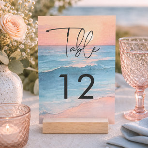 Moderne Wasserfarben-Strandhochzeit bei Sonnenunte Tischnummer
