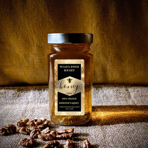 Moderner, eleganter, glänzender Goldbienenhonig
