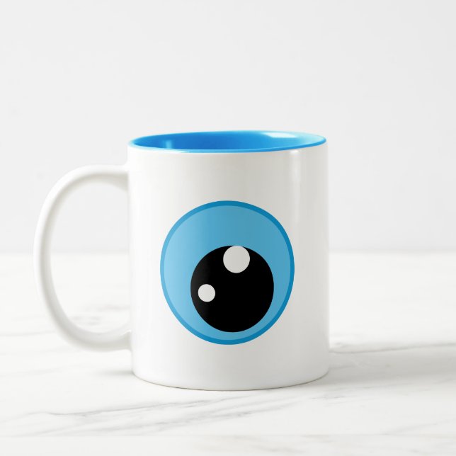 Moderner Eye-Cartoon Zweifarbige Tasse (Links)