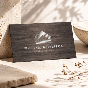 Modernes abstraktes Home-Logo auf dunklem Holzmase Visitenkarte