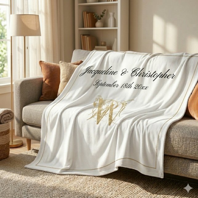 Modernes Chic Custom Newlywed Monogram Fleecedecke (Elegant gold monogram with black names and gold border against a gorgeous white fleece blanket.)