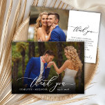 Modernes Chic Script 2 Foto Hochzeit Danke Karte<br><div class="desc">Modernes Chic Calligraphie Script Hochzeit 2 Foto Dankeschön Karte. Stilvolle Hochzeit danke Ihnen Vorlage mit einem vollen vertikalen Foto auf der Vorderseite mit dem Text "Danke" in einer skurrilen Wirblen Hand Schrift Schriftzug Swash Schwanz Schriftart in Weiß Overlay auf dem Bild und eine Rückseite ein (1) Foto und vorgefertigte Dankeschön-Nachricht....</div>