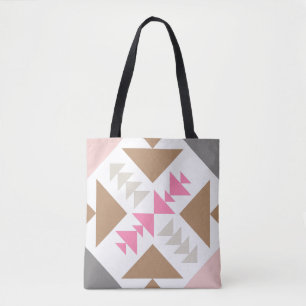 Modernes geometrisches Quiltdesign in Rosa und Kup