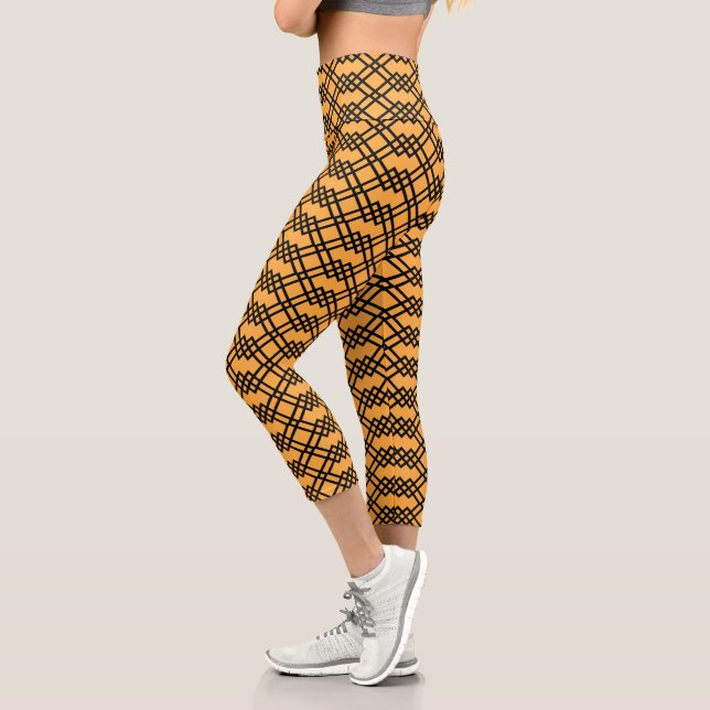 Modernes Gitter Geometrisches Schwarz & Mango Sorb Capri Leggings (Links)