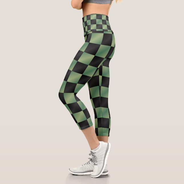 Modernes, grün-schwarzes Licht Capri Leggings (Links)