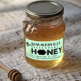Modernes Honey-Label mit Hexagon-Grenze und Biene