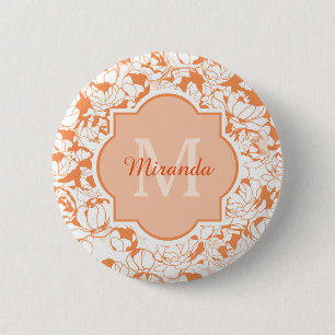 Modernes orange Girly mit Blumenmonogramm mit Button
