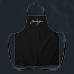 Modernes Schwarz-weißes Script Monogram Personalis Schürze<br><div class="desc">Zeigen Sie Ihren Stil mit dieser modernen Schwarz-weißen Script Monogram Personalisierten Schürze. Es ist mit einem schwarzen, alles überdruckten Hintergrund konzipiert und der erste ist grau und der Name ist in weißer Hand mit Buchstaben versehen. Eine tolle Geschenkidee für Frauen, die Liebe haben zu backen und zu kochen. Klicken Sie...</div>