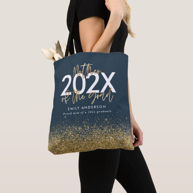 Modernster Glitzer-Abschluss mit blauer und golden (Von Nahem)