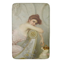 Modische Schönheit beim Spielen mit ihrem Hund Badematte