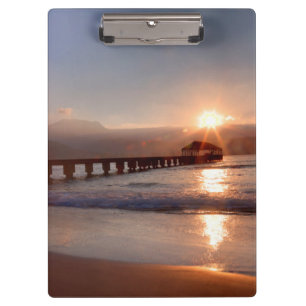 Mole am Strand bei Sonnenuntergang, Hawaii Klemmbrett