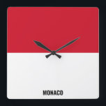 Monaco Flag Dazzling Patriotic Quadratische Wanduhr<br><div class="desc">Monaco Flag Dazzling Patriotic Square Wall Uhr in den Farben und die Elemente der Monaco Nationalflagge, die die Front der Uhr. Die nationalen Flaggenfarben werden durch den Text "Monaco" unten ergänzt. Der Text kann mit der Funktion "Anpassen!" vollständig angepasst werden. Fühlen Sie sich frei, es zu ändern, zu entfernen oder...</div>