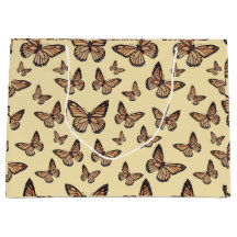 Monarch Butterfliegen auf Gelb