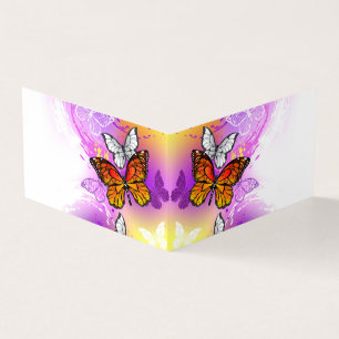 Monarch Butterflies on Purple Background