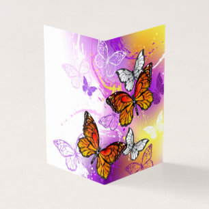 Monarch Butterflies on Purple Background
