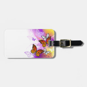 Monarch Butterflies on Purple Background Gepäckanhänger