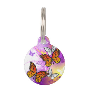 Monarch Butterflies on Purple Background Haustiermarke