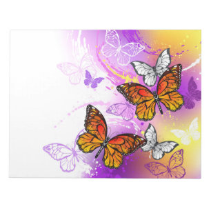 Monarch Butterflies on Purple Background Notizblock