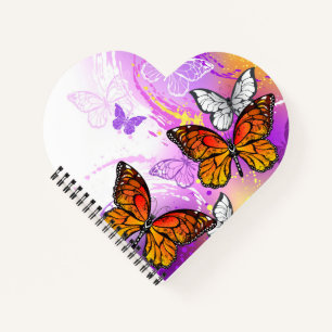 Monarch Butterflies on Purple Background Notizbuch