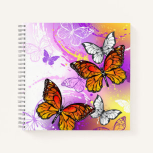 Monarch Butterflies on Purple Background Notizbuch