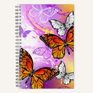 Monarch Butterflies on Purple Background Notizbuch