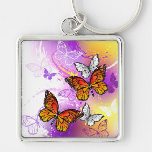 Monarch Butterflies on Purple Background Schlüsselanhänger