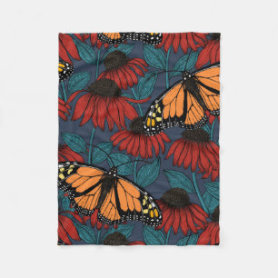 Monarch butterfly on red coneflowers fleecedecke