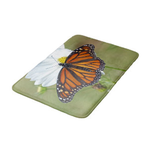 Monarch Butterfly über den Kosmos Badematte