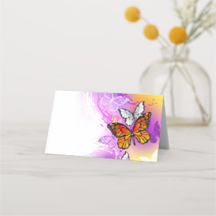 Monarch-Schmetterlinge auf violettem Hintergrund Terminkarte