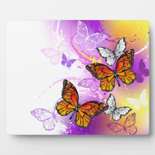 Monarchfalter auf violettem Hintergrund Fotoplatte