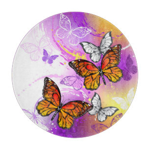 Monarchfalter auf violettem Hintergrund Schneidebrett