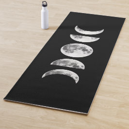 Mondphasen auf der schwarzen Yoga-Matte Yogamatte
