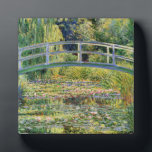 Monet Japanese Bridge with Water Lilies Fotoplatte<br><div class="desc">Monet Japanese Bridge with Water Lilies Nummernschild. Oil painting on canvas from 1899. Monet painted the Japanese style bridge above his water lily pond at Giverny multiple times throughout his long career. This is one of the most famous of Monet's Japanese Bridge paintings. The work feature the bridge at mid...</div>