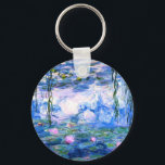 Monet Pink Water Lilies Schlüsselanhänger<br><div class="desc">Ein rosa Monet-Schlüsselanhänger mit rosafarbenen Seerosen,  die in einem ruhigen,  blauen Teich mit Lilienblättern schwimmen. Ein großartiges Monet-Geschenk für die Liebhaber von Impressionismus und französischer Kunst.</div>