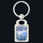 Monet Pink Water Lilies Schlüsselanhänger<br><div class="desc">Ein rosa Monet-Schlüsselanhänger mit wunderschönen rosafarbenen Seerosen,  die in einem ruhigen,  blauen Teich mit Lilienblättern schwimmen. Ein großartiges Monet-Geschenk für die Liebhaber von Impressionismus und französischer Kunst.</div>