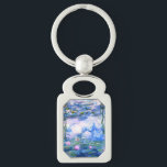 Monet Pink Water Lilies Schlüsselanhänger<br><div class="desc">Ein rosa Monet-Schlüsselanhänger mit wunderschönen rosafarbenen Seerosen,  die in einem ruhigen,  blauen Teich mit Lilienblättern schwimmen. Ein großartiges Monet-Geschenk für die Liebhaber von Impressionismus und französischer Kunst.</div>