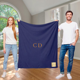 Monografie des Navy Blue Gold Firmenlogos Fleecedecke