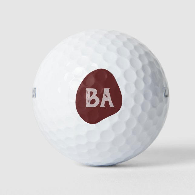 Monogramm-Anfangsbuchstaben in Rosé auf Burgunder- Golfball (Vorderseite)