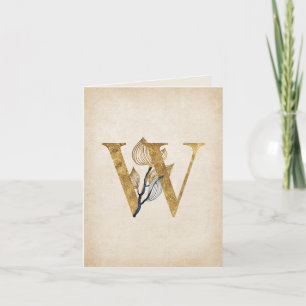 Monogramm aus Gold und Schwarz mit Blätter