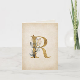 Monogramm aus Gold und Schwarz mit Blätter